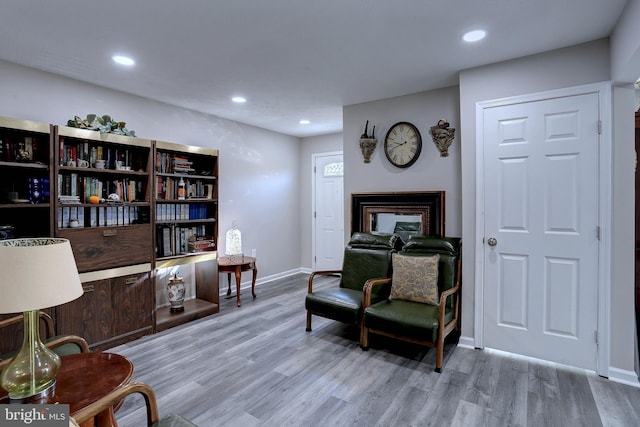 sitting room featuring light wood-type flooring