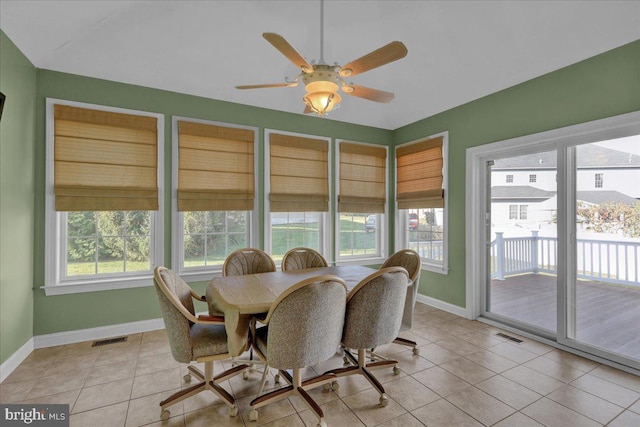 dining area featuring light tile patterned flooring and ceiling fan