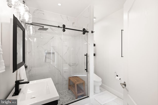 bathroom featuring vanity, toilet, tile patterned floors, and an enclosed shower