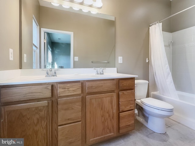 full bathroom featuring toilet, shower / tub combo with curtain, vanity, and tile patterned floors