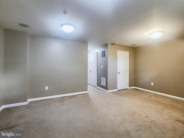 spare room with carpet floors