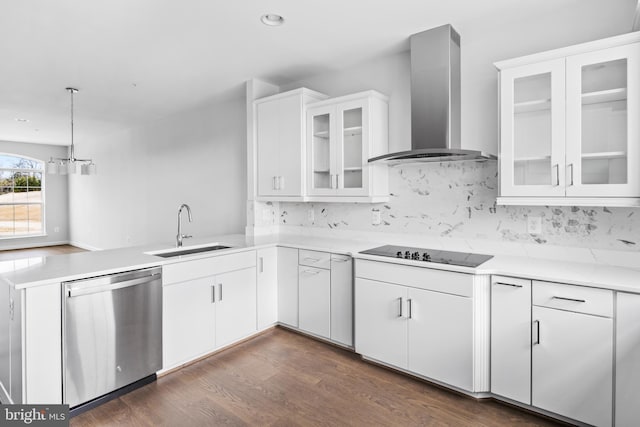 kitchen with wall chimney exhaust hood, dishwasher, and white cabinets