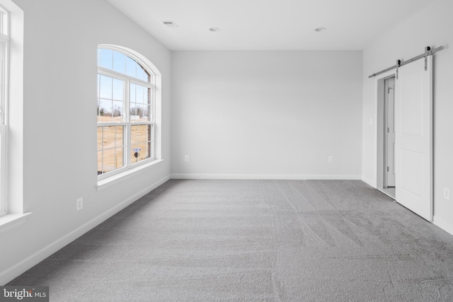 0 Triggerfish Dr, National Harbor, MD 20745 - unfurnished bedroom with baseboards, carpet flooring, recessed lighting, and a barn door