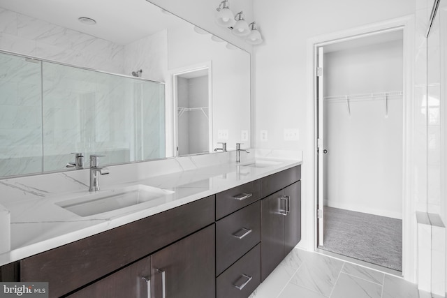 bathroom featuring vanity and walk in shower