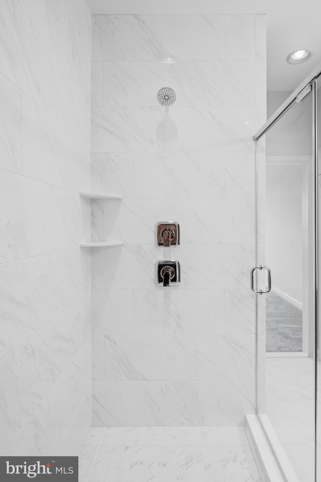 bathroom featuring walk in shower