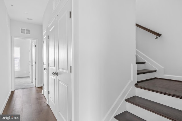 0 Triggerfish Dr, National Harbor, MD 20745 - staircase featuring baseboards, wood finished floors, and visible vents