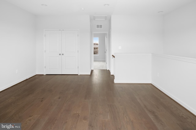 empty room featuring dark hardwood / wood-style floors