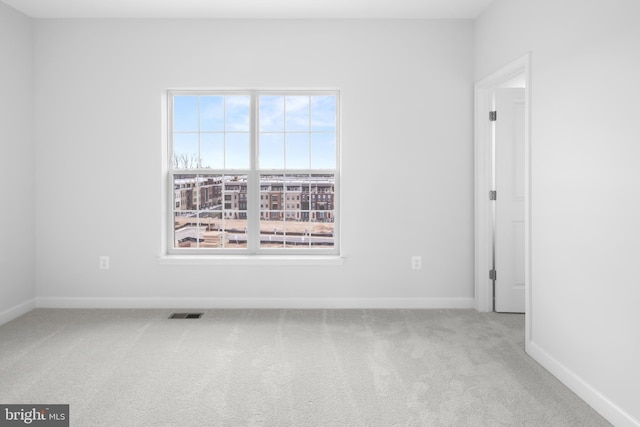 0 Triggerfish Dr, National Harbor, MD 20745 - unfurnished room featuring visible vents, baseboards, and carpet floors