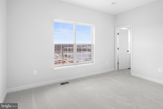 view of carpeted spare room