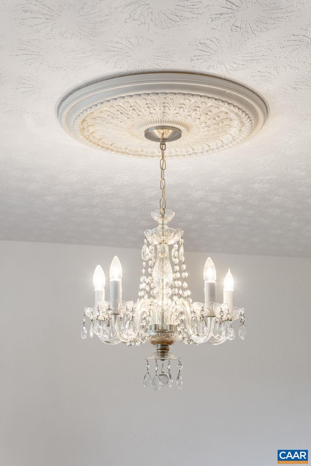 interior details featuring a textured ceiling