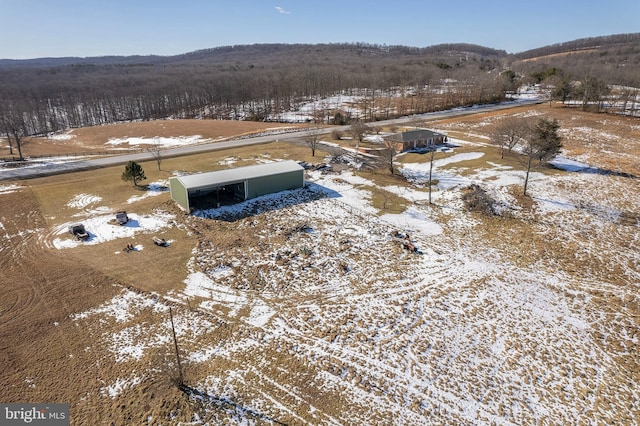 snowy aerial view with a rural view