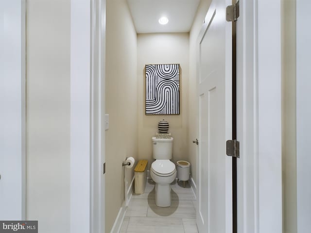 bathroom featuring toilet