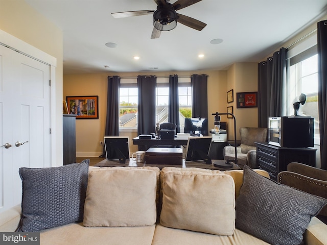 living room featuring ceiling fan