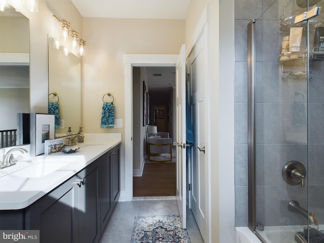 bathroom with vanity and tile patterned floors