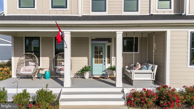 doorway to property with a porch