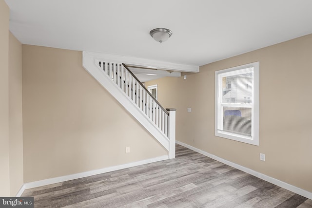 stairs with wood-type flooring