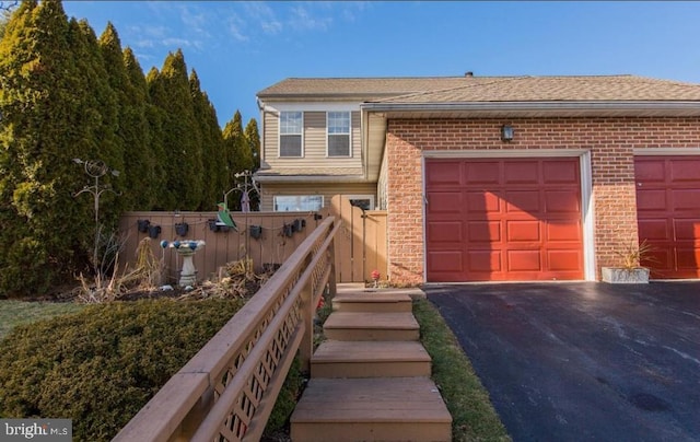 view of front of home featuring a garage