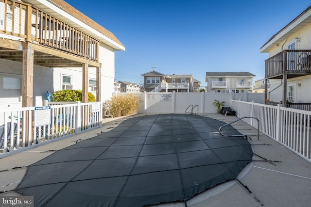 view of pool featuring a wooden deck