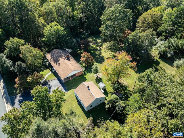 drone / aerial view with a view of trees