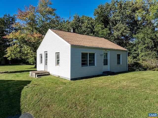 exterior space with a front yard