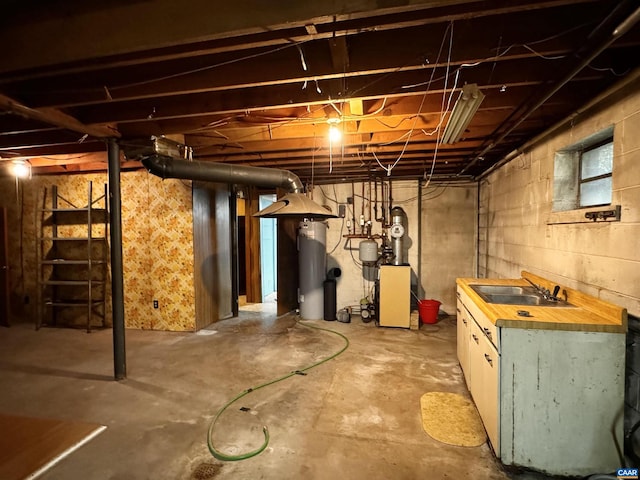 basement featuring a sink and a heating unit