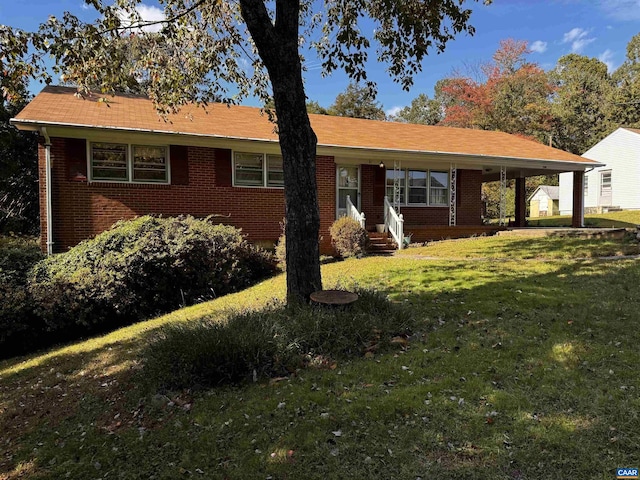 single story home featuring a front lawn