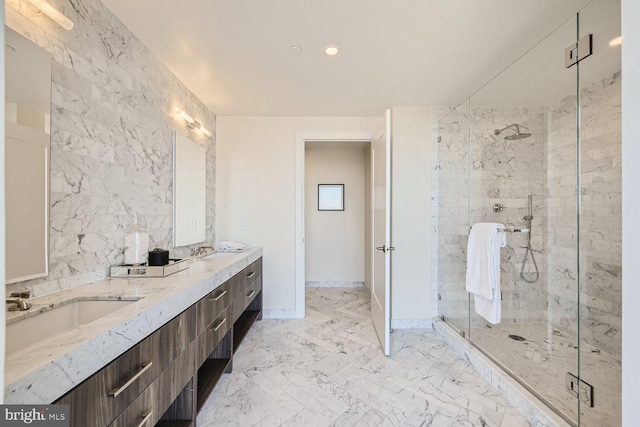 bathroom with vanity and an enclosed shower