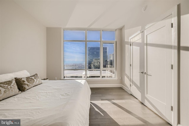 bedroom with light hardwood / wood-style flooring