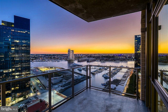 balcony at dusk with a water view