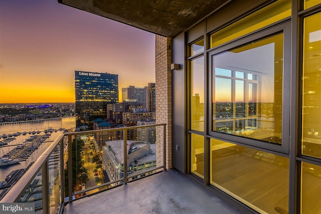 balcony at dusk with a water view