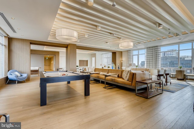 playroom with pool table and light hardwood / wood-style floors