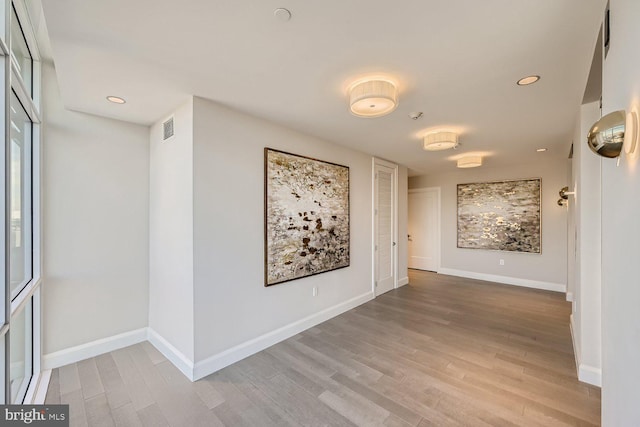 hallway featuring light hardwood / wood-style floors