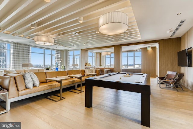 recreation room with pool table, light hardwood / wood-style flooring, and plenty of natural light