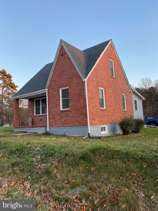 view of home's exterior featuring a yard and a patio area