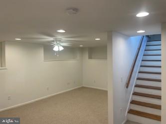 basement with carpet flooring