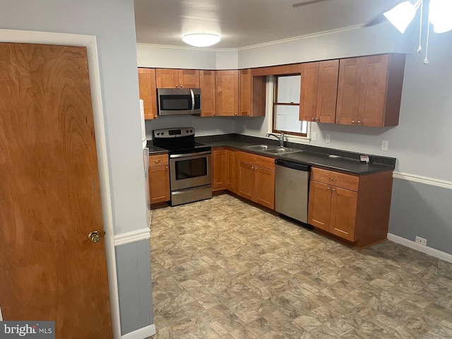 kitchen with sink and appliances with stainless steel finishes