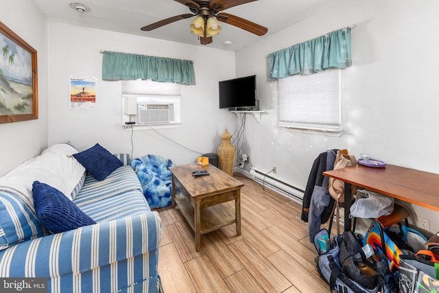 living room with a baseboard radiator, ceiling fan, wood-type flooring, and cooling unit