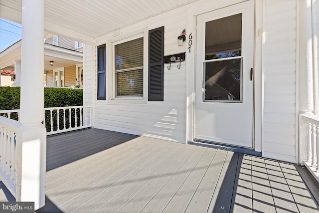 deck featuring covered porch