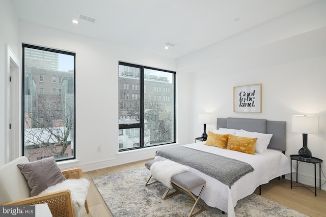 bedroom featuring light hardwood / wood-style floors