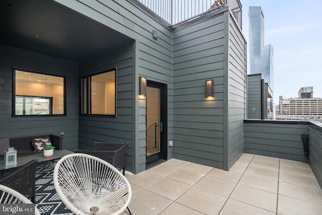 view of patio / terrace featuring a balcony