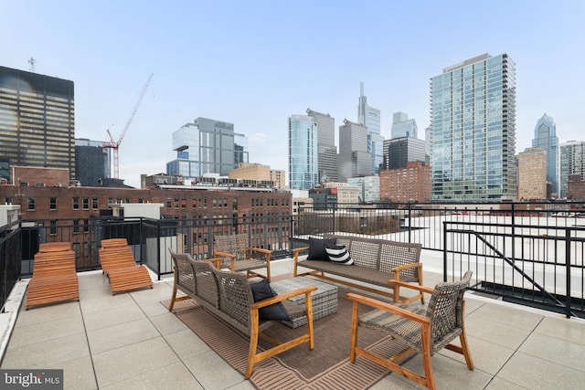 view of patio / terrace featuring outdoor lounge area and a balcony