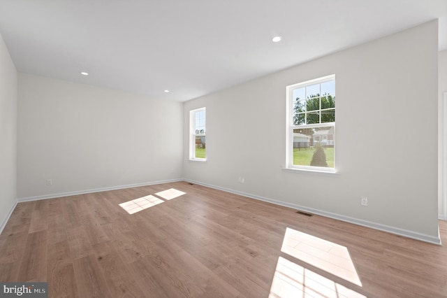 empty room featuring light hardwood / wood-style flooring