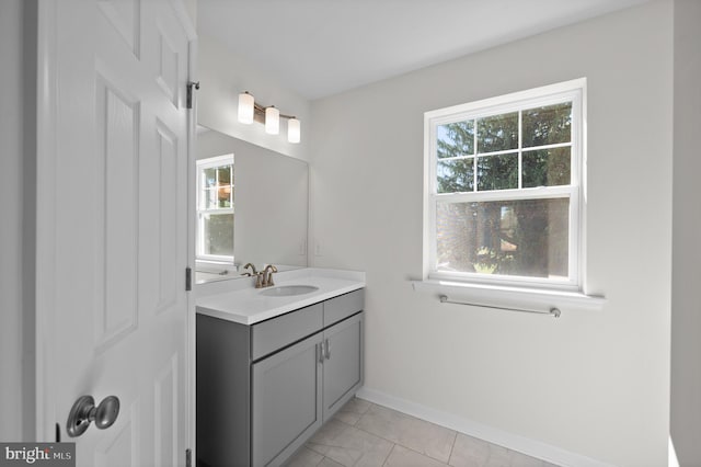 bathroom with vanity and tile patterned flooring