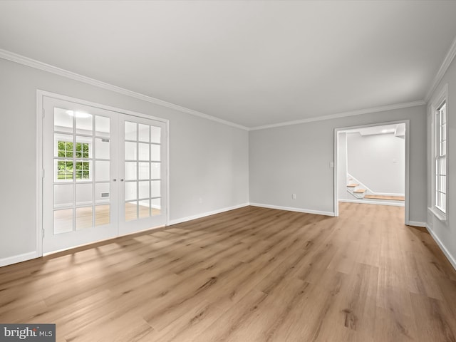 8018 Martown Rd, Laurel, MD 20723 - spare room featuring stairs, ornamental molding, and light wood-type flooring