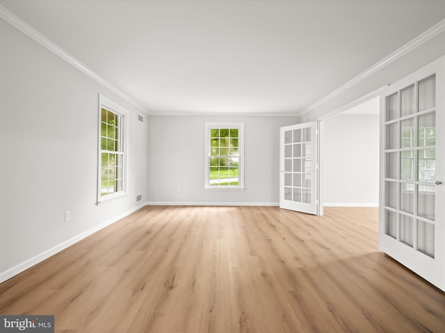 8018 Martown Rd, Laurel, MD 20723 - unfurnished room with crown molding, light wood-type flooring, and french doors