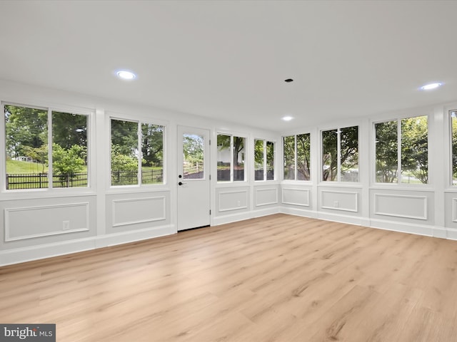 8018 Martown Rd, Laurel, MD 20723 - unfurnished sunroom featuring a wooden deck, wood finished floors, and recessed lighting