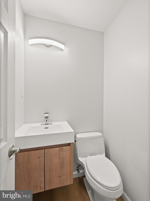 8018 Martown Rd, Laurel, MD 20723 - half bath with wood finished floors and vanity