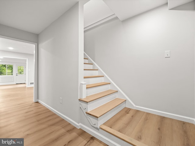 8018 Martown Rd, Laurel, MD 20723 - stairs with wood finished floors and baseboards
