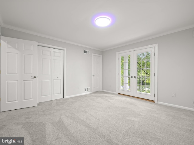 8018 Martown Rd, Laurel, MD 20723 - unfurnished bedroom featuring ornamental molding, french doors, access to outside, carpet floors, and a closet