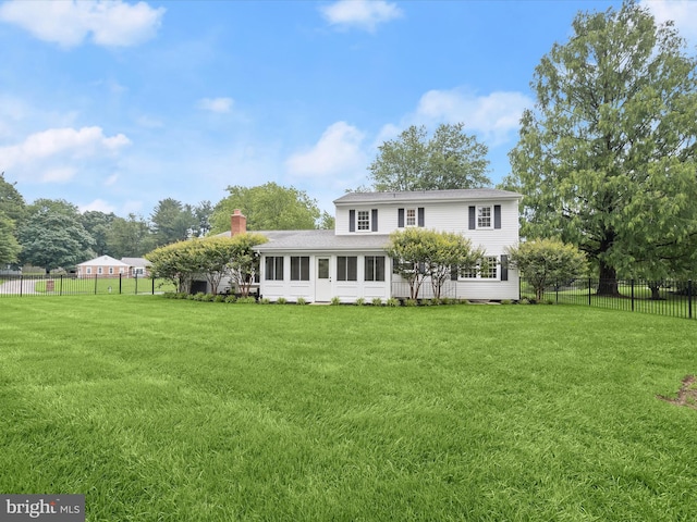 8018 Martown Rd, Laurel, MD 20723 - view of front of property with a fenced backyard, a sunroom, and a chimney
